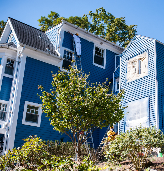 blue home after exterior painting 